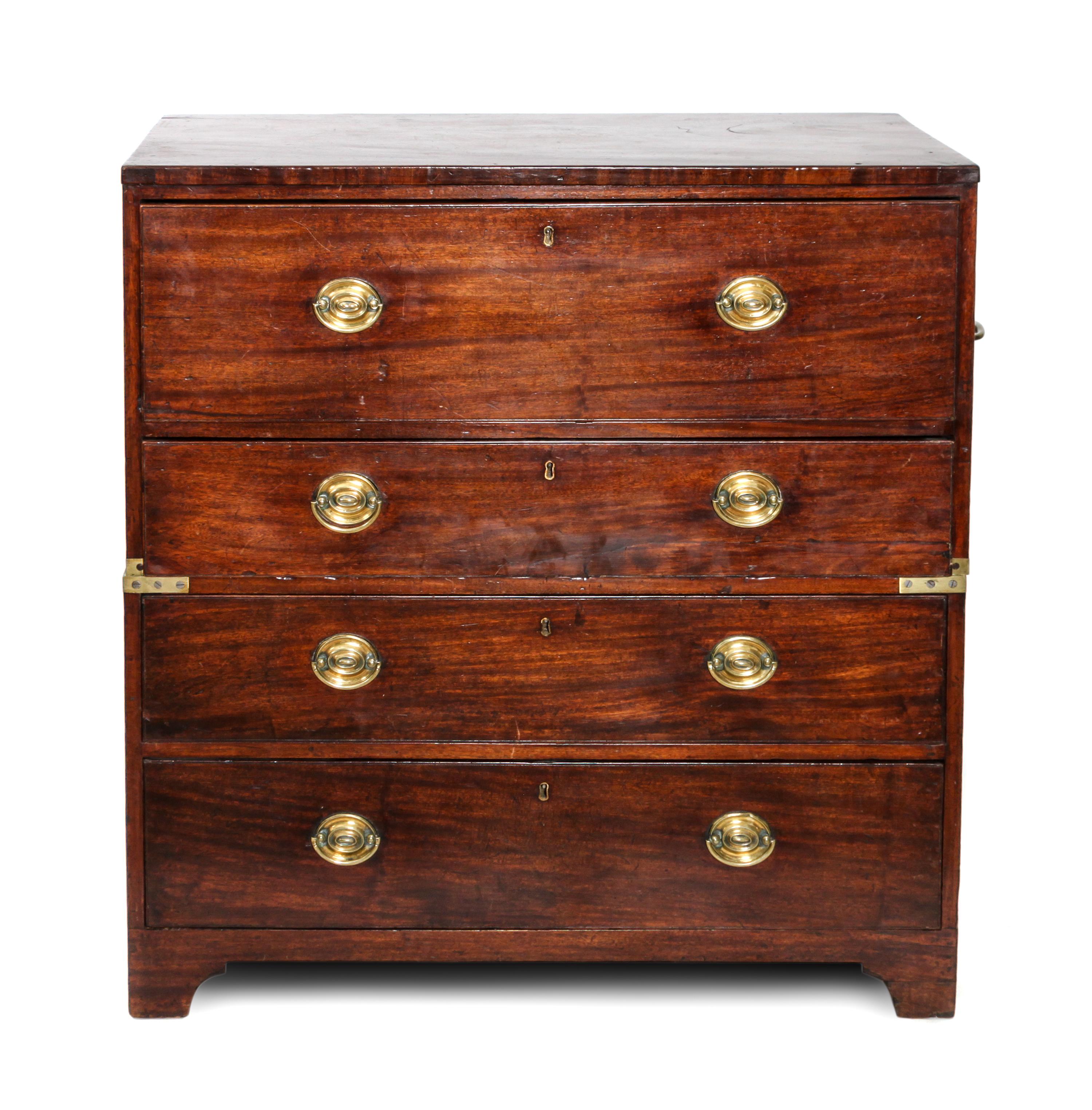A Campaign Style Mahogany Secretaire Chest of Drawers Height 39 1/2 x width 38 x depth 20 inches — CIRCA 1910