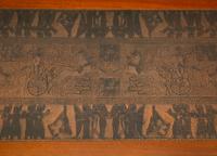 A Scandinavian Modern Teak Low Table with Egyptian Motif Stamped Copper Top