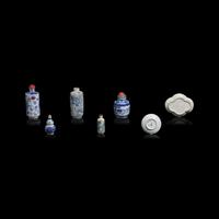 A Group of Five Assorted Chinese Snuff Bottles and Two Saucers