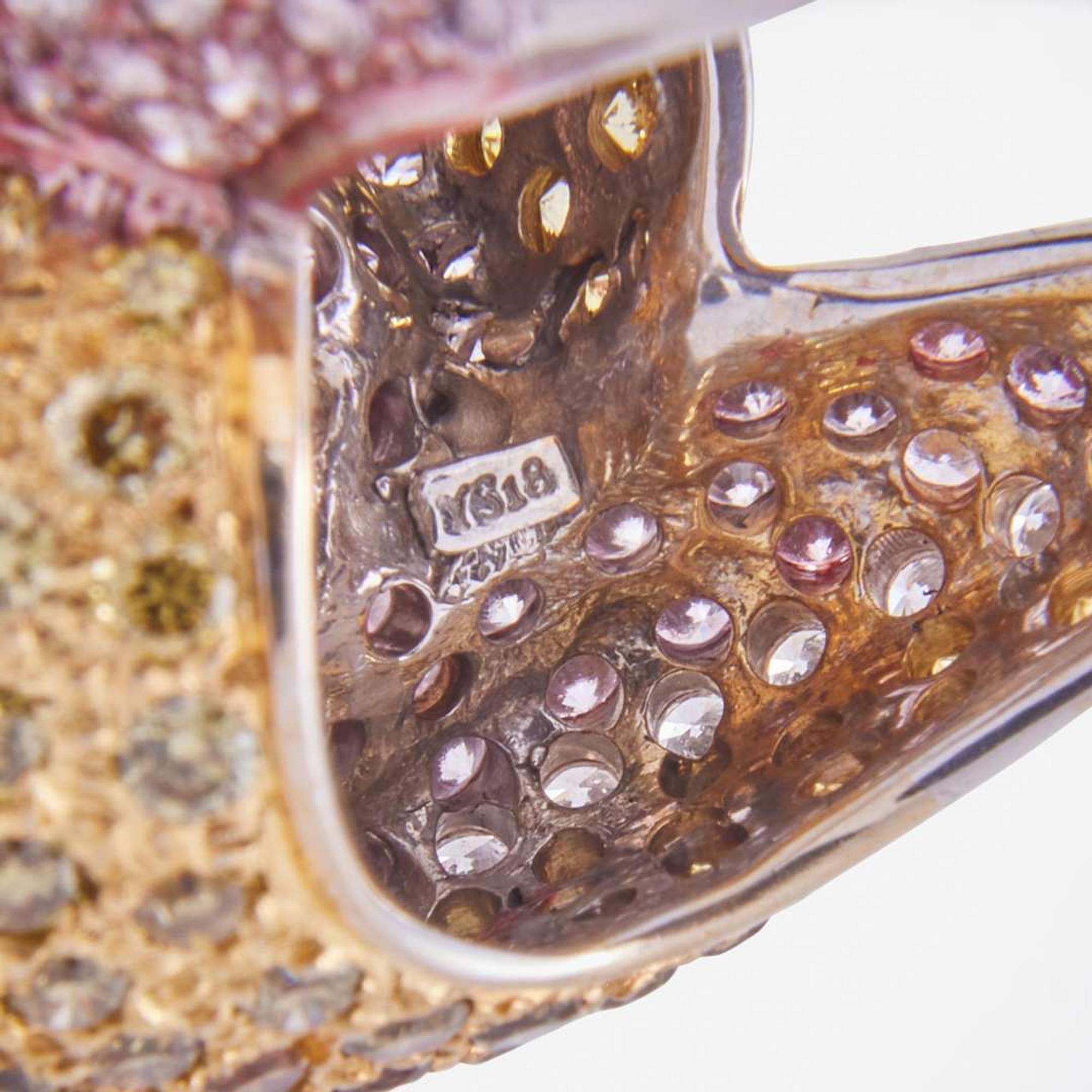 An 18K White Gold and Multi-Color Diamond Ring