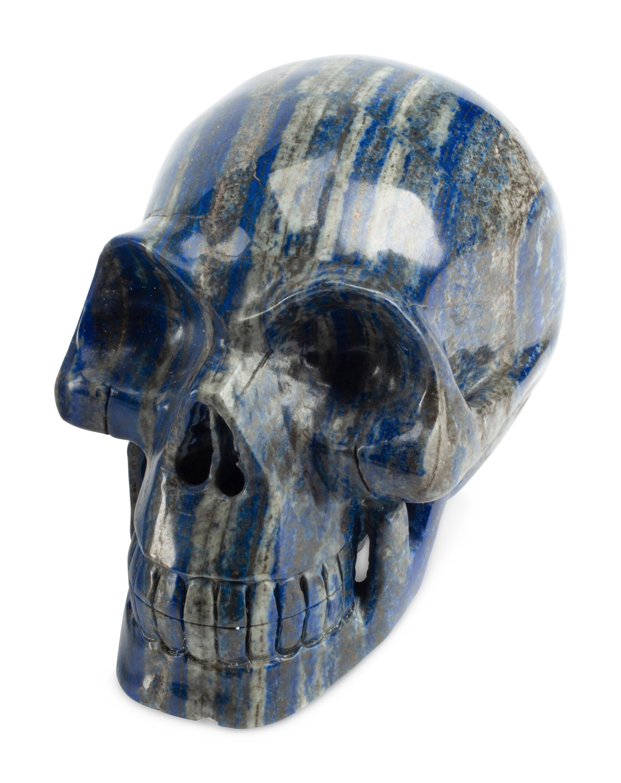 A Set of Three Carved Semi-Precious Stone Skulls