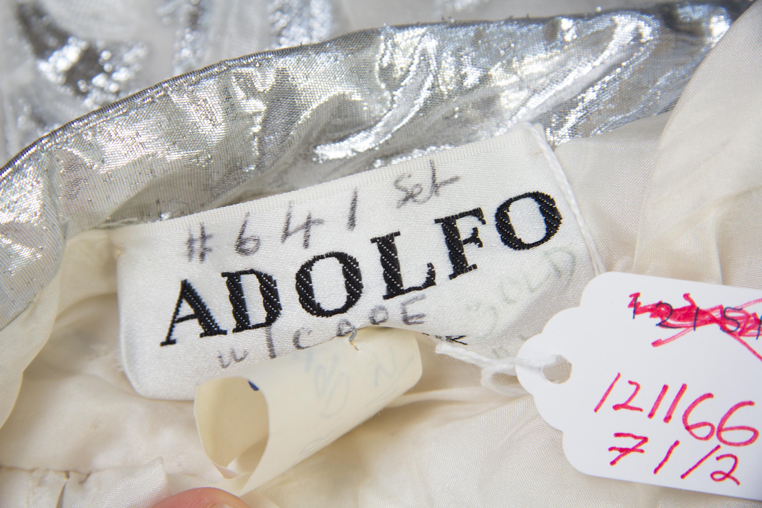 An Adolfo Cream and Silver Layered Silk Chiffon Evening Gown,