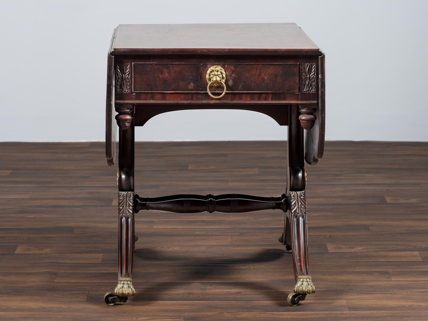 A Classical Brass-Mounted Walnut and Mahogany Pembroke Table