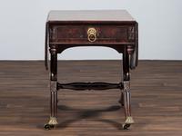 A Classical Brass-Mounted Walnut and Mahogany Pembroke Table