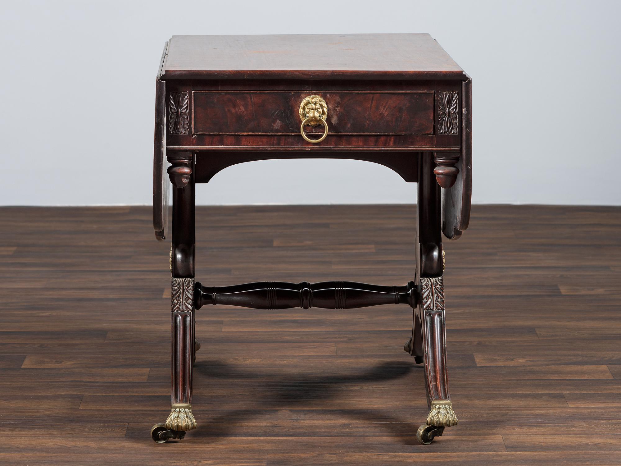 A Classical Brass-Mounted Walnut and Mahogany Pembroke Table