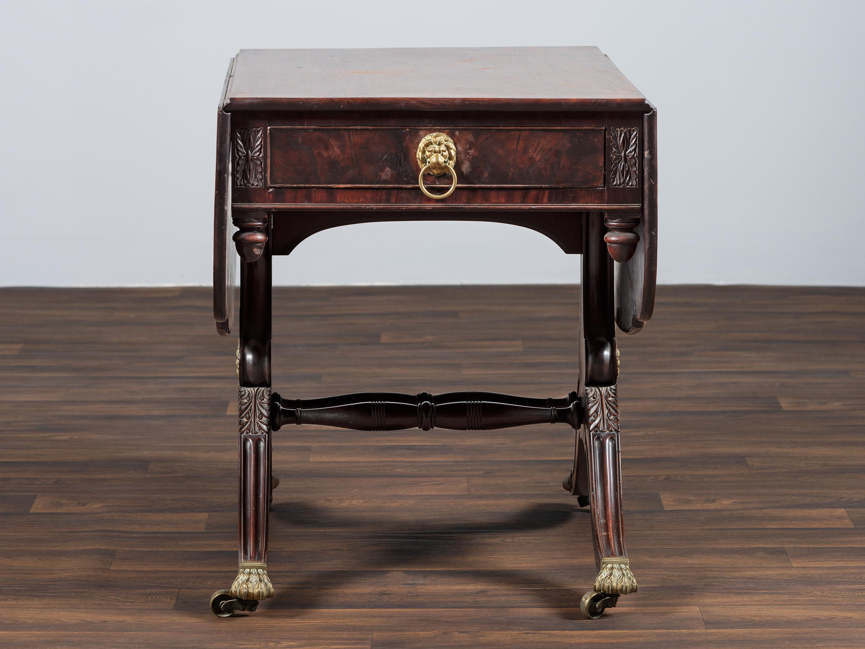 A Classical Brass-Mounted Walnut and Mahogany Pembroke Table