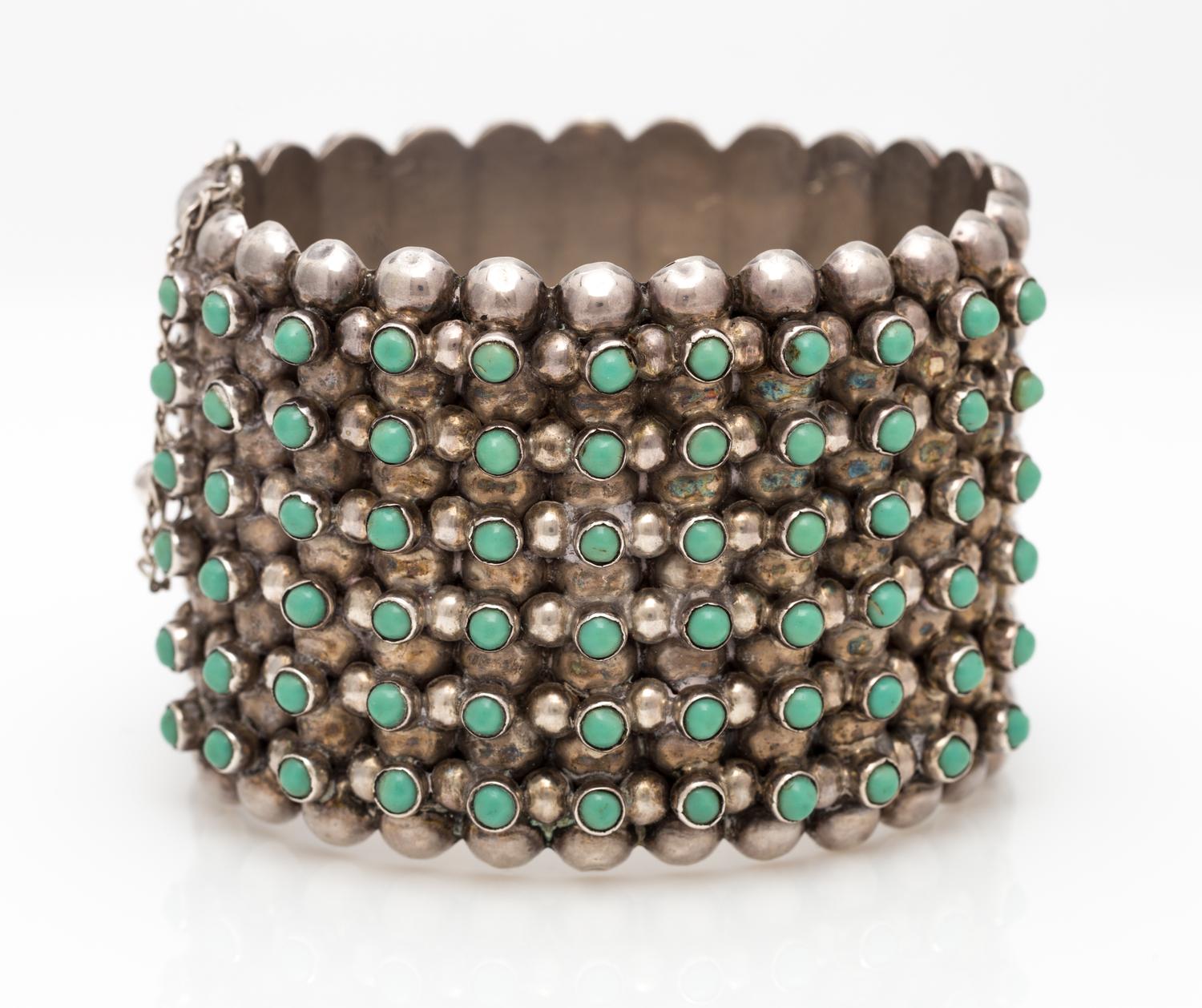 A Sterling Silver and Turquoise Dot Bangle Bracelet, Pre-1948, 49.20 dwts.