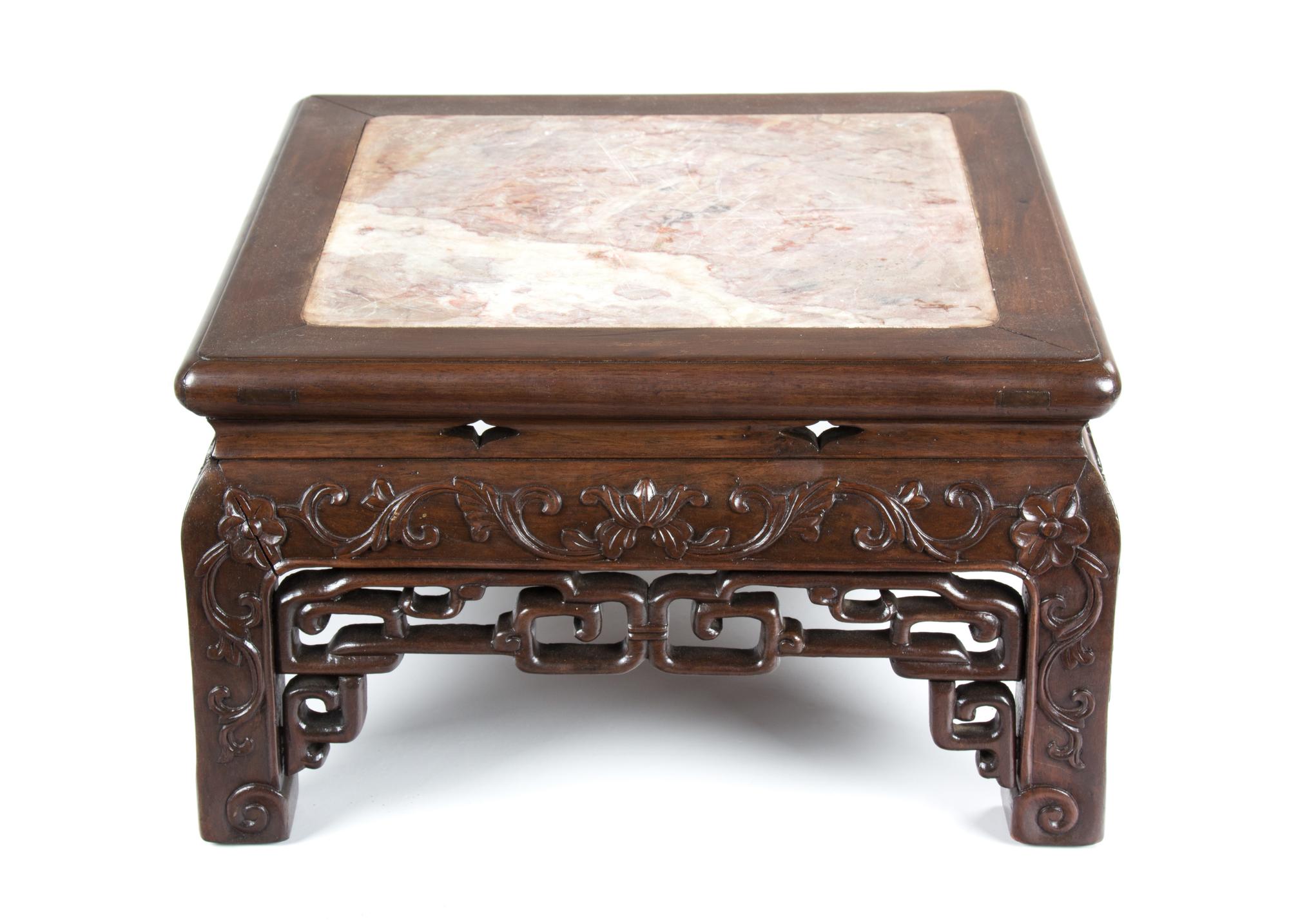A Chinese Export Carved Rosewood Low Pedestal Height 9 3/4 x width 16 1/4 x depth 16 1/4 inches. — 20TH CENTURY