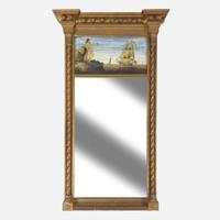 Two carved and giltwood and églomisé pier glasses circa 1810