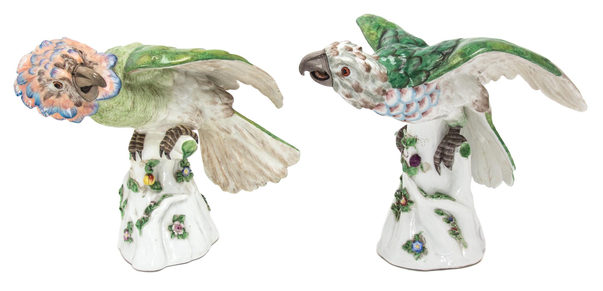 A Pair of German Porcelain Models of Parrots Height of first 9 inches. — 19TH CENTURY