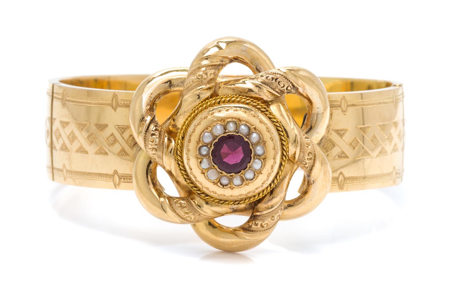 A Yellow Gold, Garnet and Seed Pearl Bracelet, 17.70 dwts.