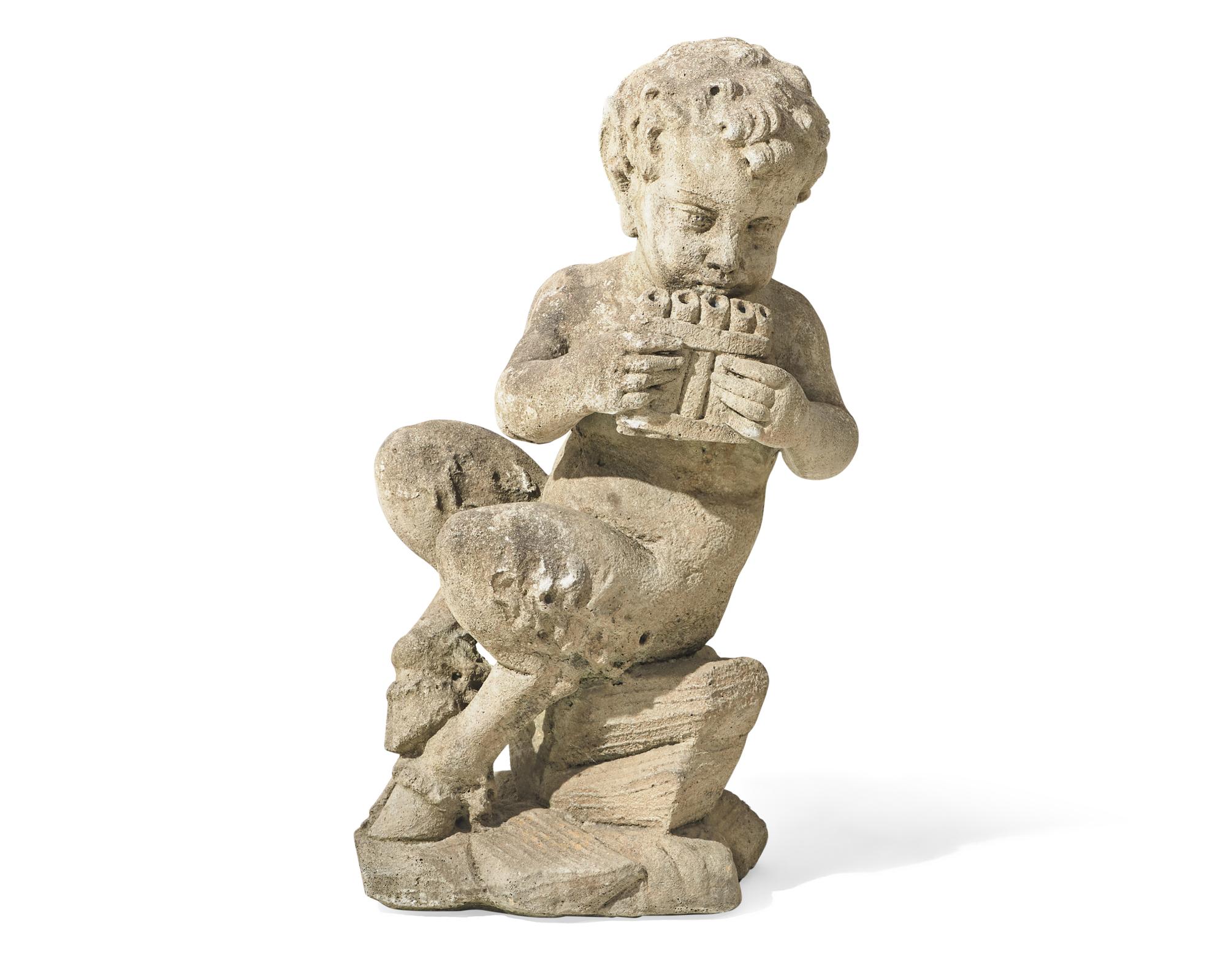 A small cast stone / concrete statue of a faun, early 20th century
