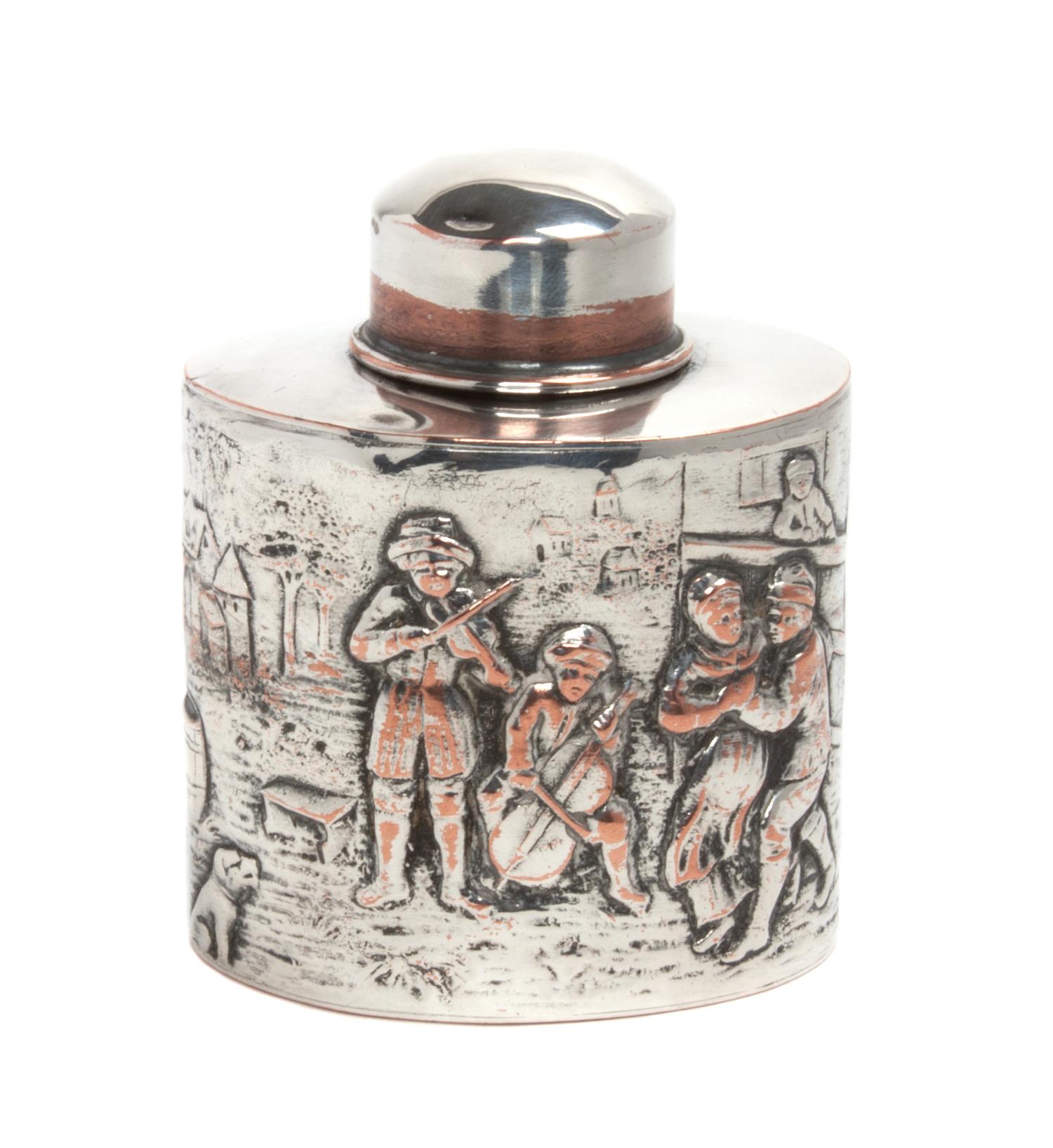 A Silver-Plate Bottle, , of oval form with a removable lid, the body worked to depict a village scene with revelers playing music.