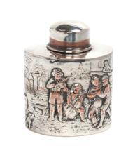 A Silver-Plate Bottle, , of oval form with a removable lid, the body worked to depict a village scene with revelers playing music.
