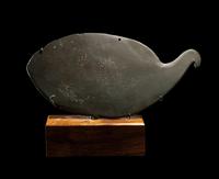 An Egyptian Greywacke Cosmetic Palette in the Form of a Bird