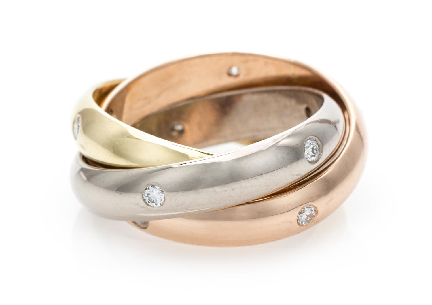 An 18 Karat Tricolor Gold and Diamond Trinity Ring, Cartier, 6.80 dwts.