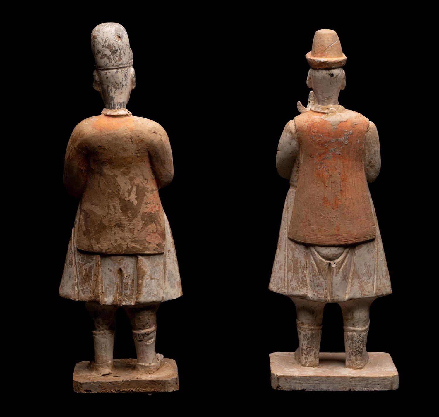 A Pair of Chinese Painted Pottery Figures of Attendants