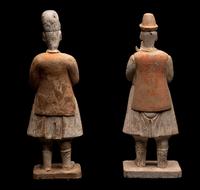 A Pair of Chinese Painted Pottery Figures of Attendants