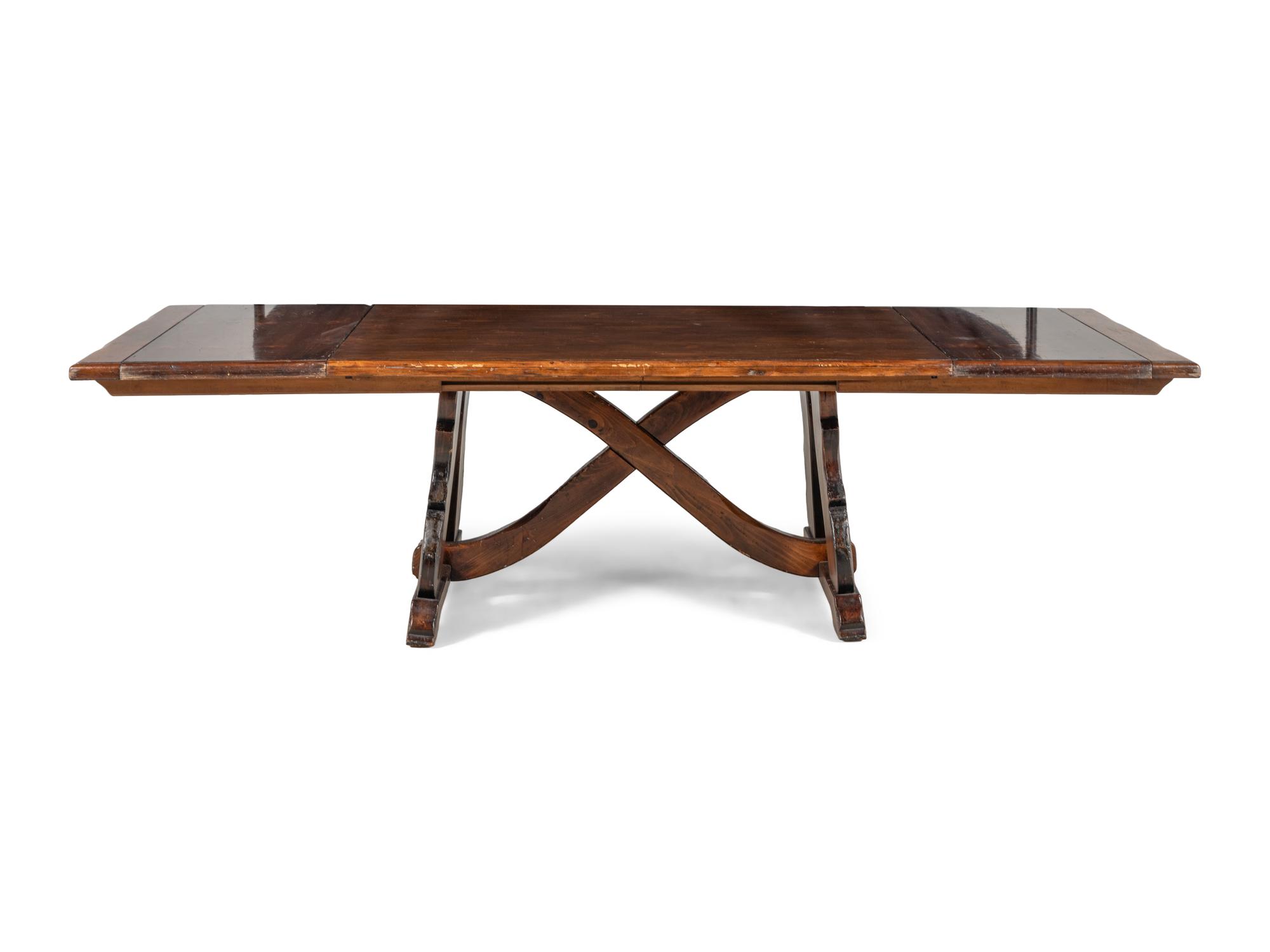 A Spanish Colonial Style Oak Trestle Table