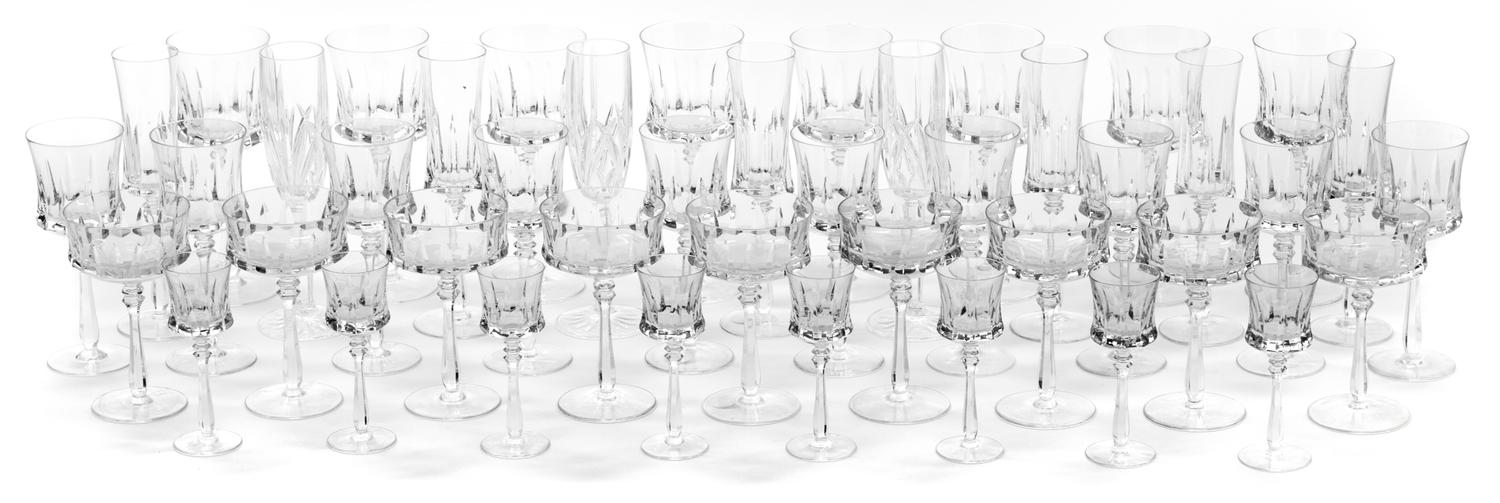 A Cut Glass Stemware Service Height of tallest champagne flute 9 inches. — 20TH CENTURY