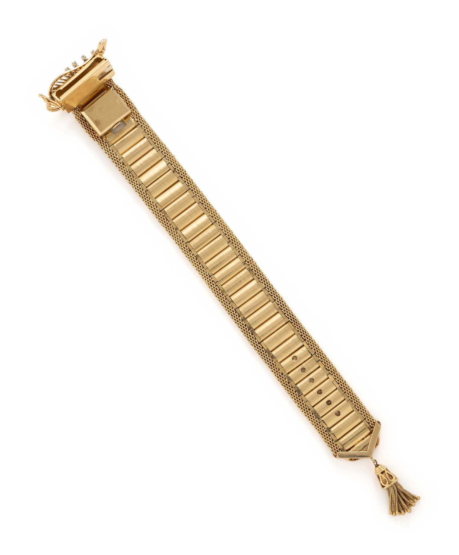 YELLOW GOLD AND DIAMOND SURPRISE WATCH