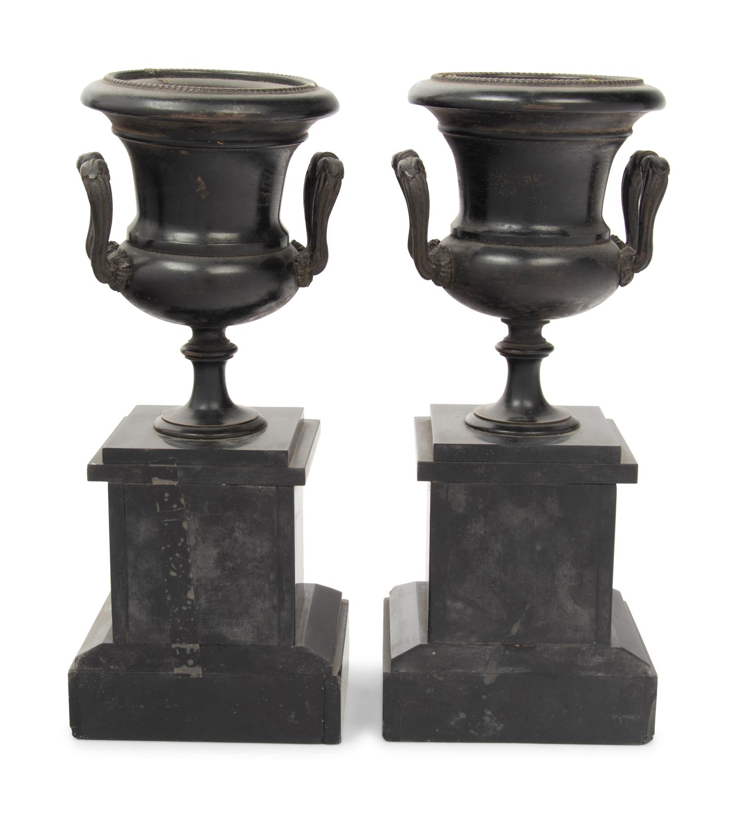A Pair of Continental Patinated Metal Urns