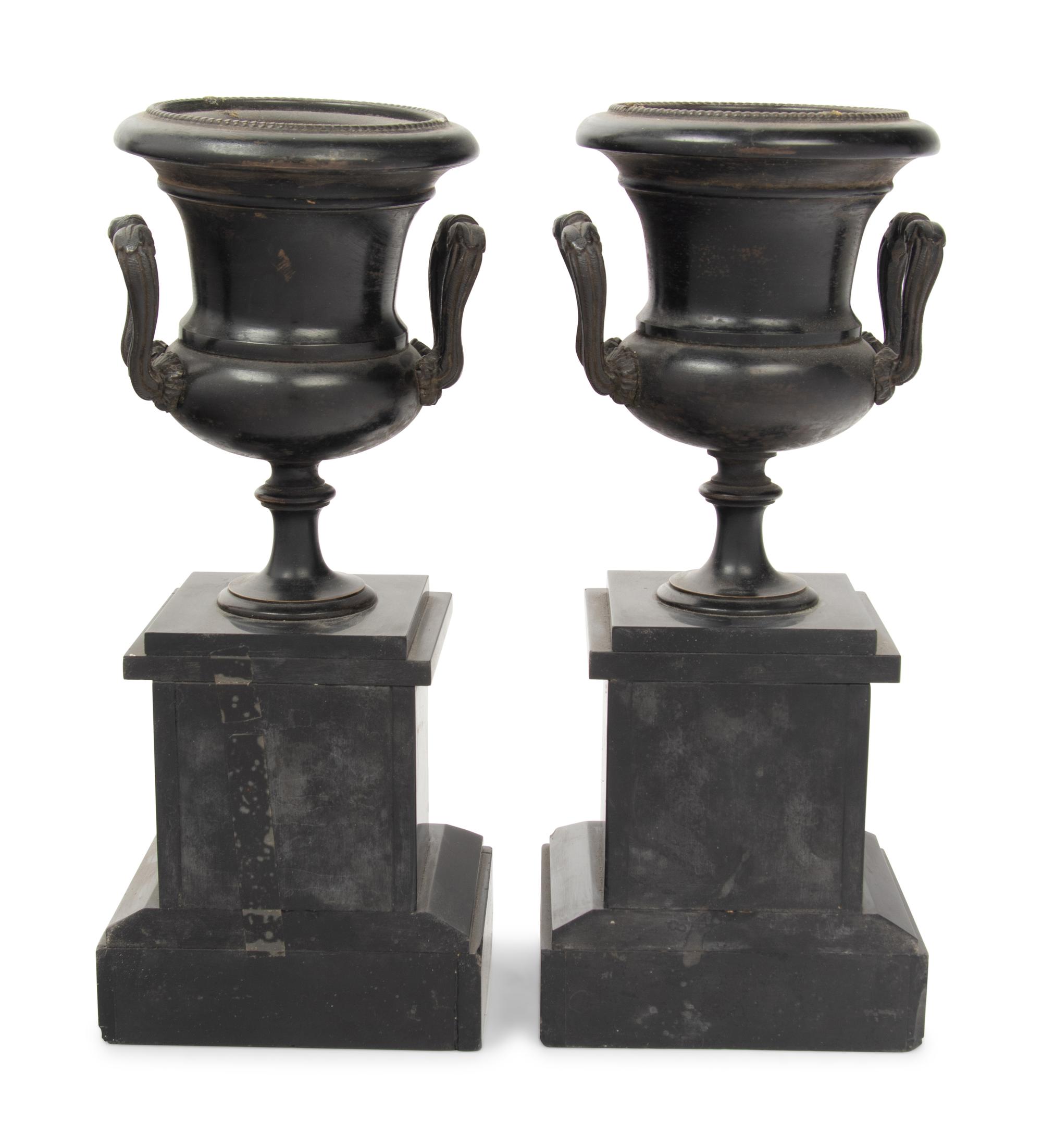 A Pair of Continental Patinated Metal Urns