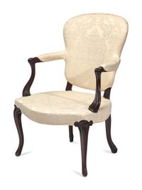 A George III Carved Mahogany or Beech Armchair in the French Taste