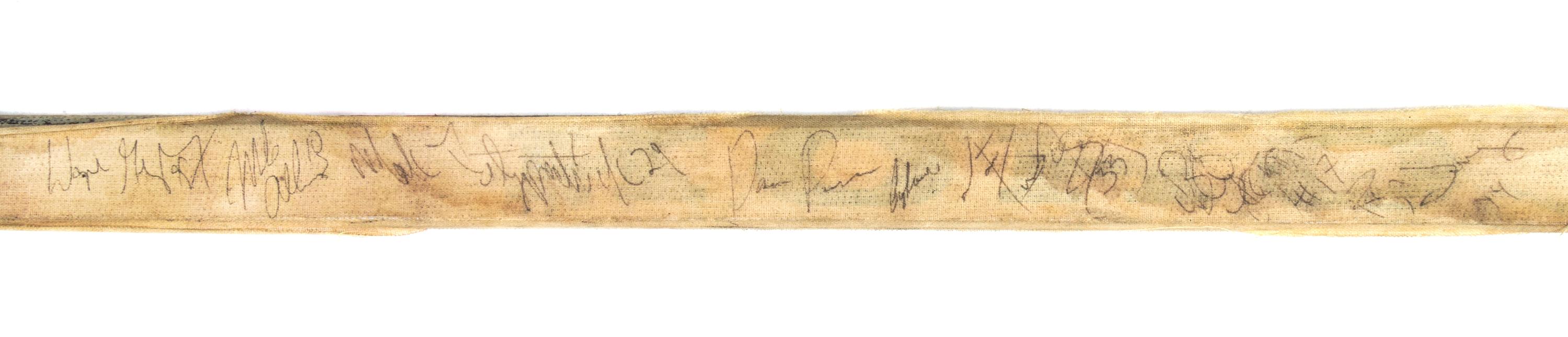 (HOCKEY) GRETZKY, WAYNE. Luc Robitaille hockey stick signed by 9 members of the 1988-89 LA Kings, including Gretzky.