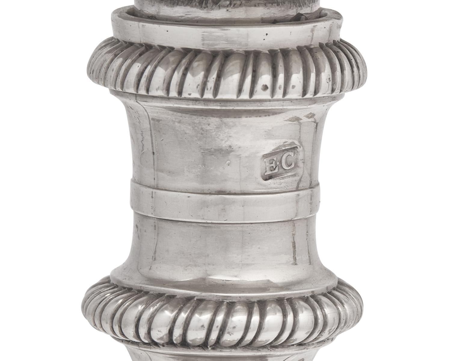 An Assembled Set Of Four George III Sterling Silver Candlesticks