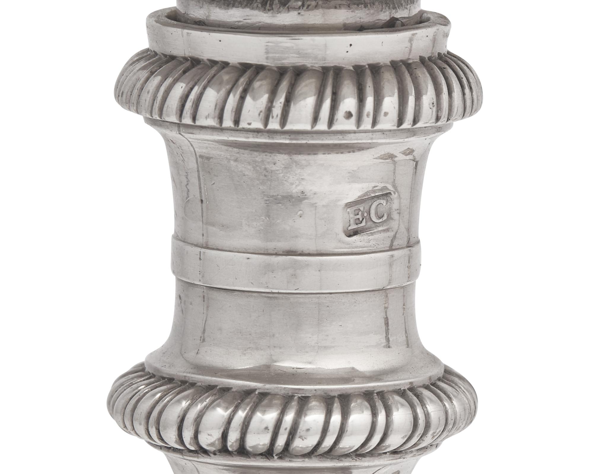 An Assembled Set Of Four George III Sterling Silver Candlesticks