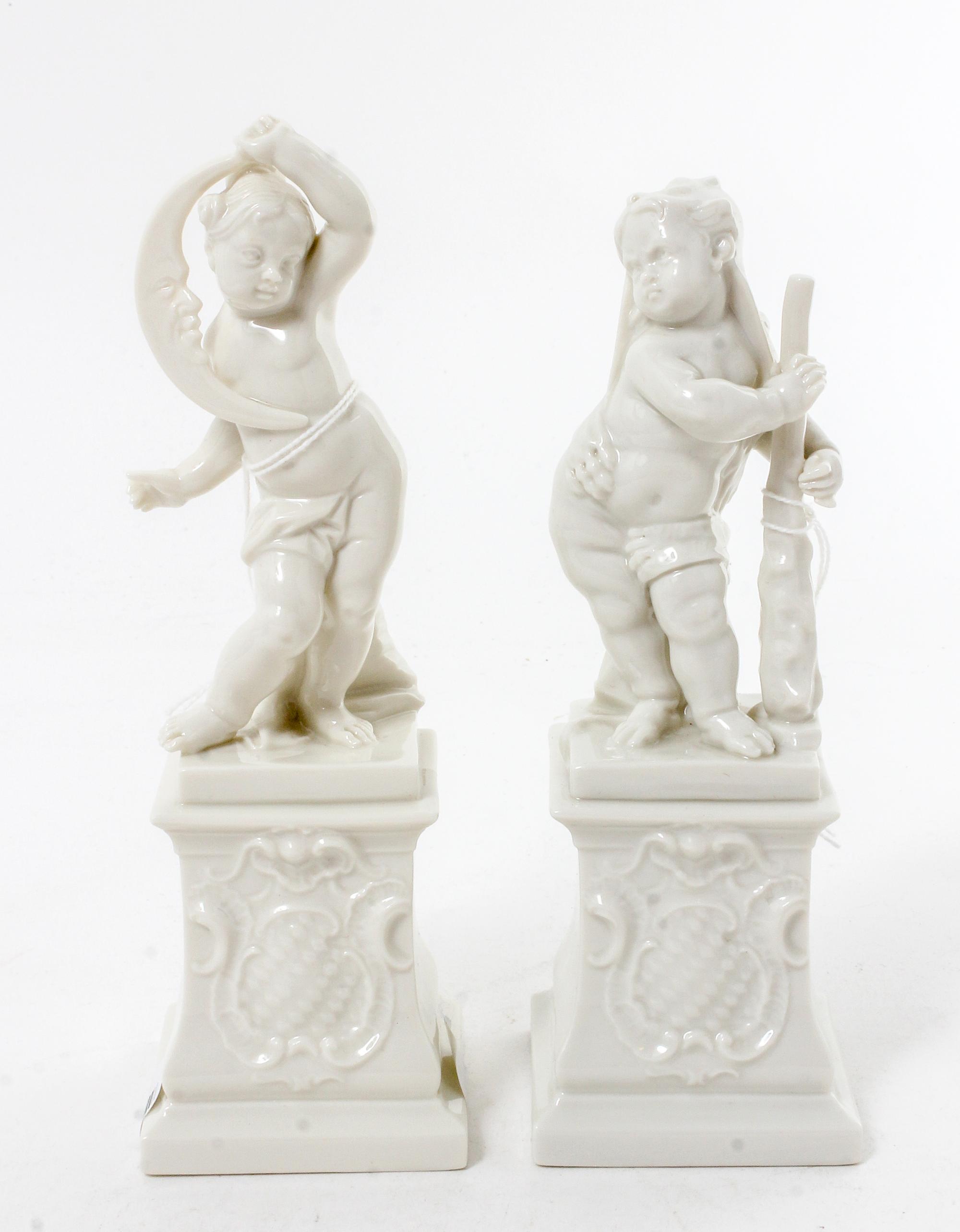 A Pair of Nymphenburg Blanc-de-Chine Porcelain Figures Height of taller 7 inches.