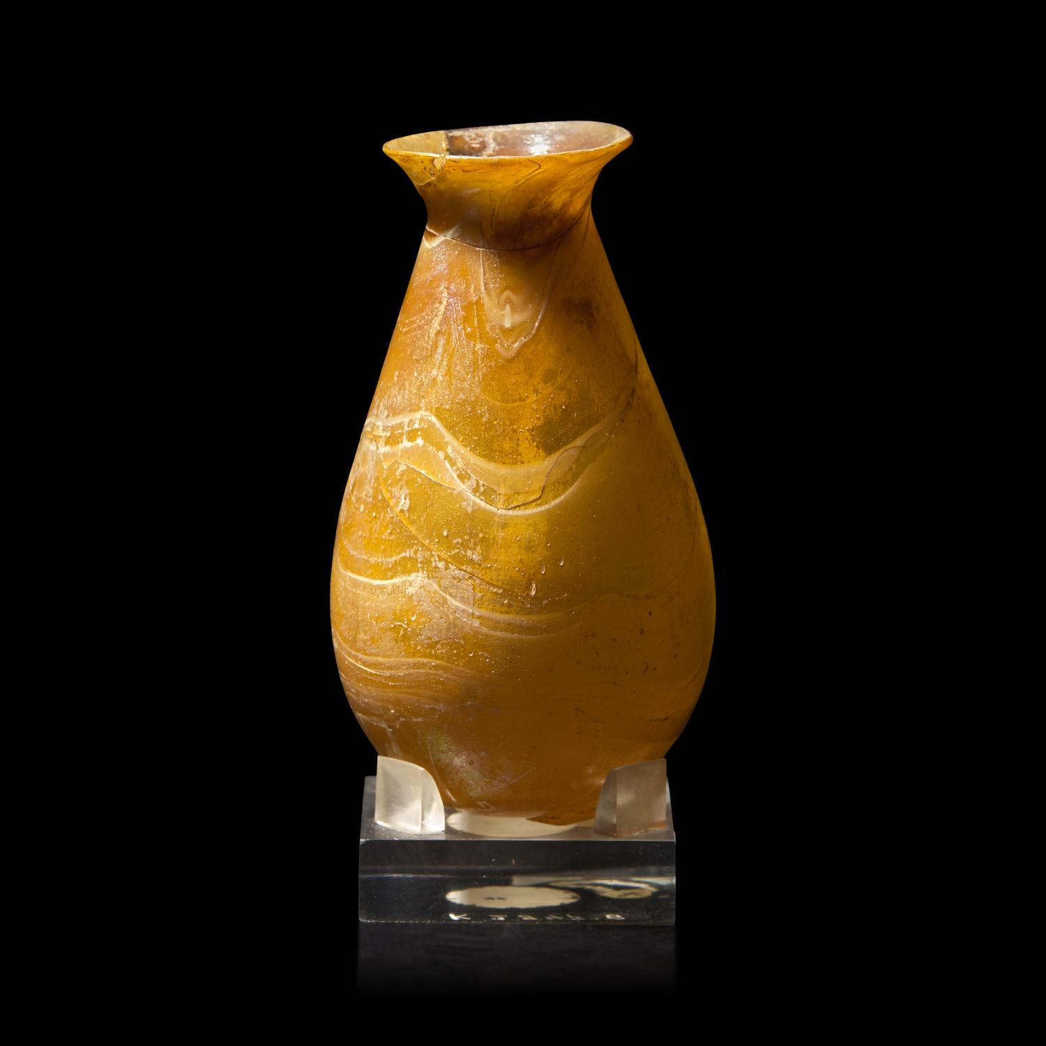 A Roman Amber Marbled Glass Flask