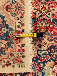 A Kirman Wool Rug