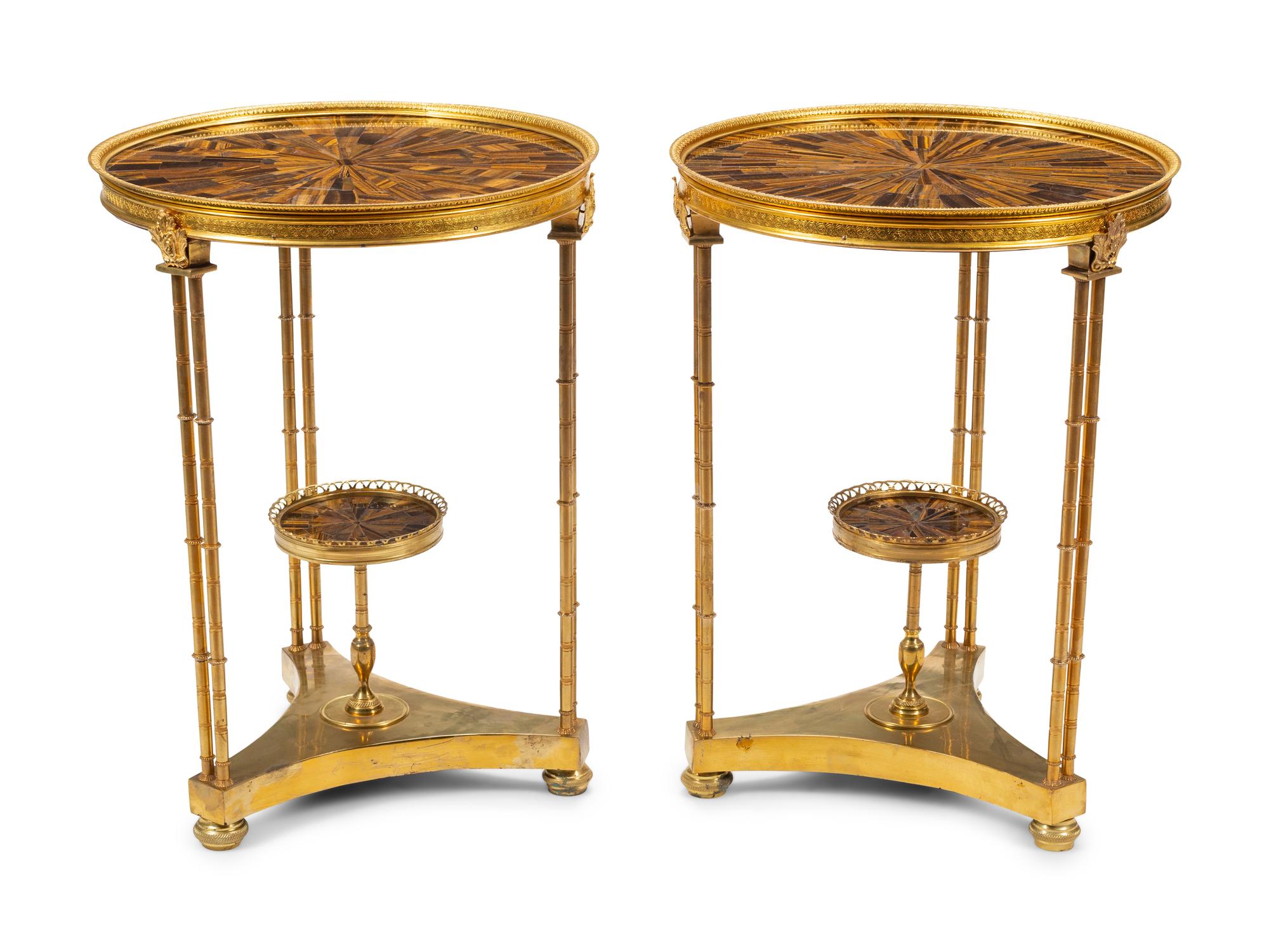 A Pair of Louis XVI Style Gilt Bronze and Tiger's Eye Tables in the Manner of Adam Weisweiler