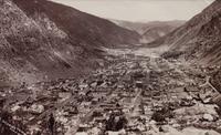A group of four photographs (8098. Panorama of Denver; Untitled (roof tops of a town; Untitled (mining town); Georgetown)