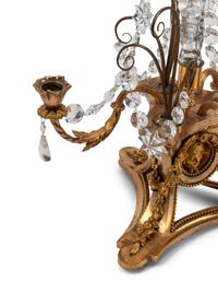 A Pair of French Gilt Bronze, Cut Glass and Rock Crystal Three-Light Candelabra