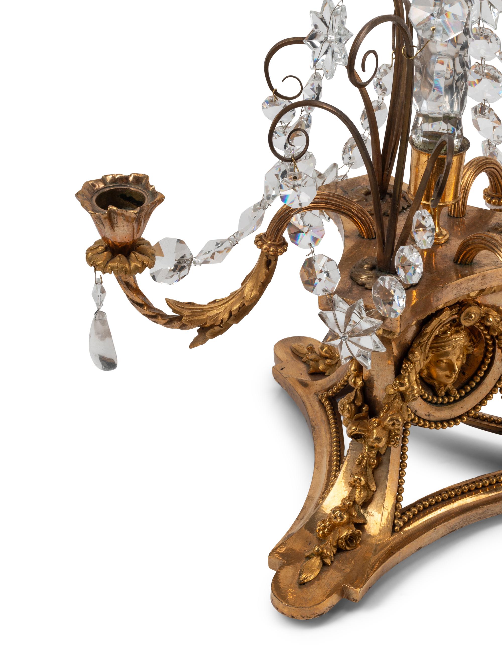 A Pair of French Gilt Bronze, Cut Glass and Rock Crystal Three-Light Candelabra