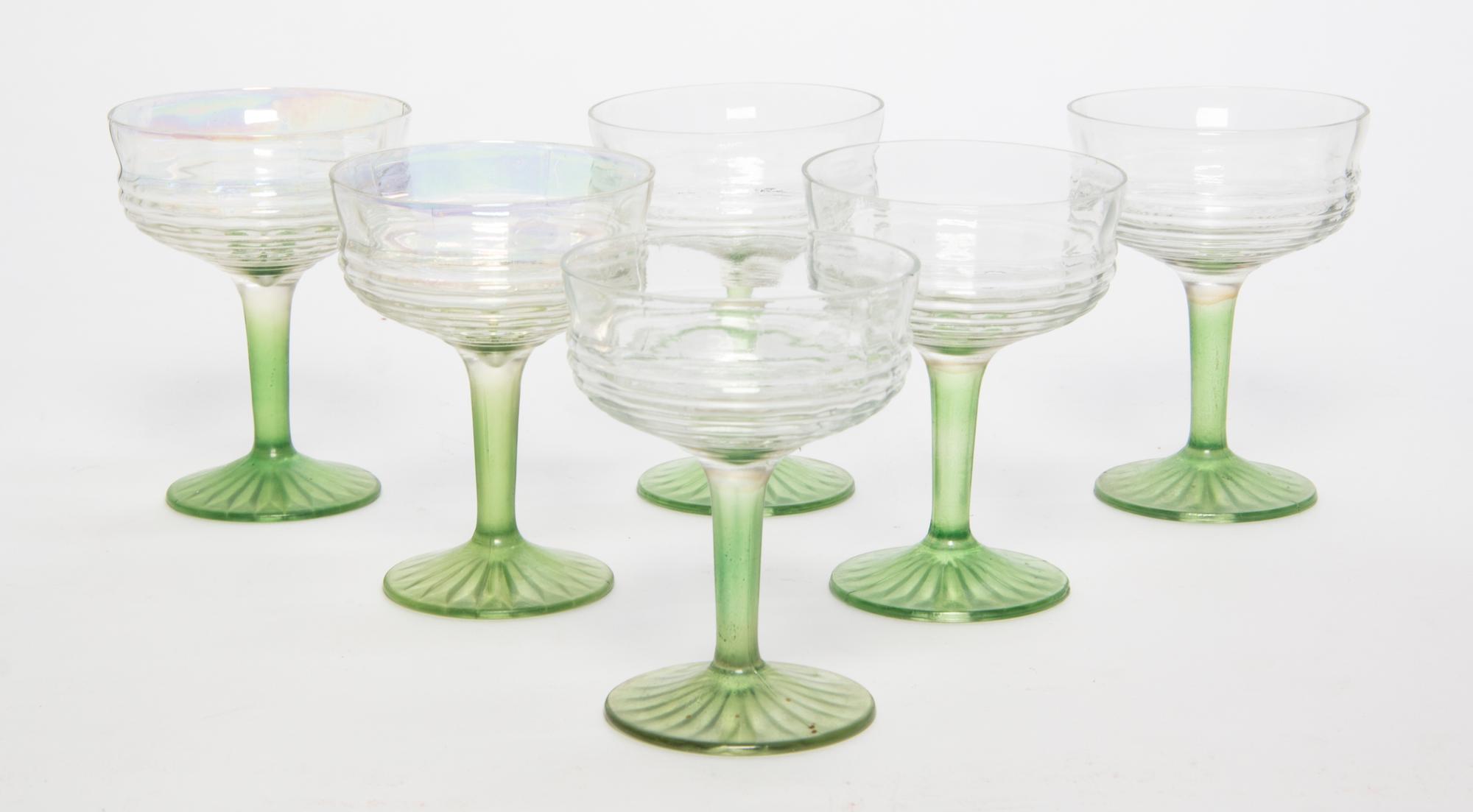 A Group of Six Iridescent Glass Champagne Coupes Height 4 3/4 inches.