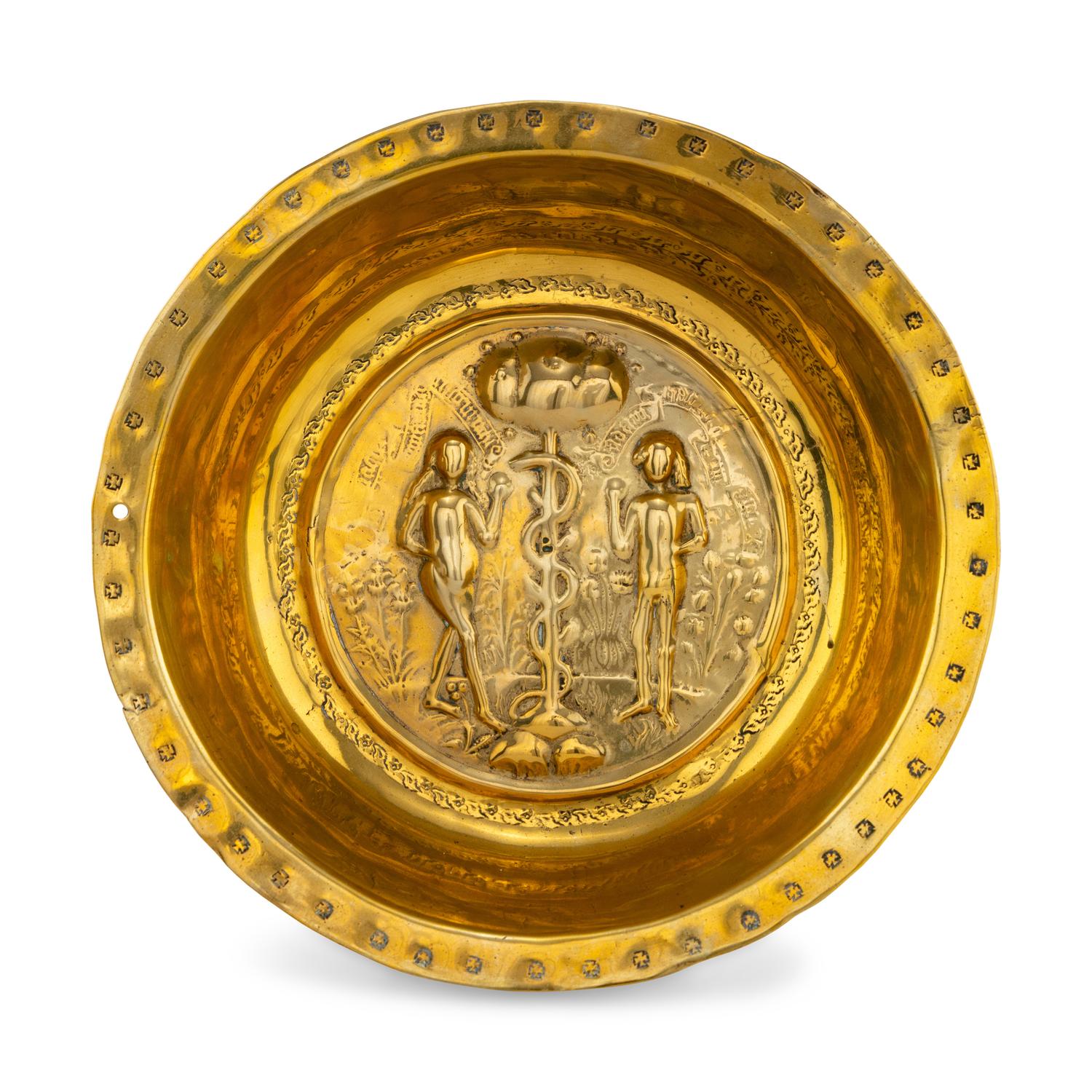 A Nuremburg Brass Adam and Eve Alms Bowl