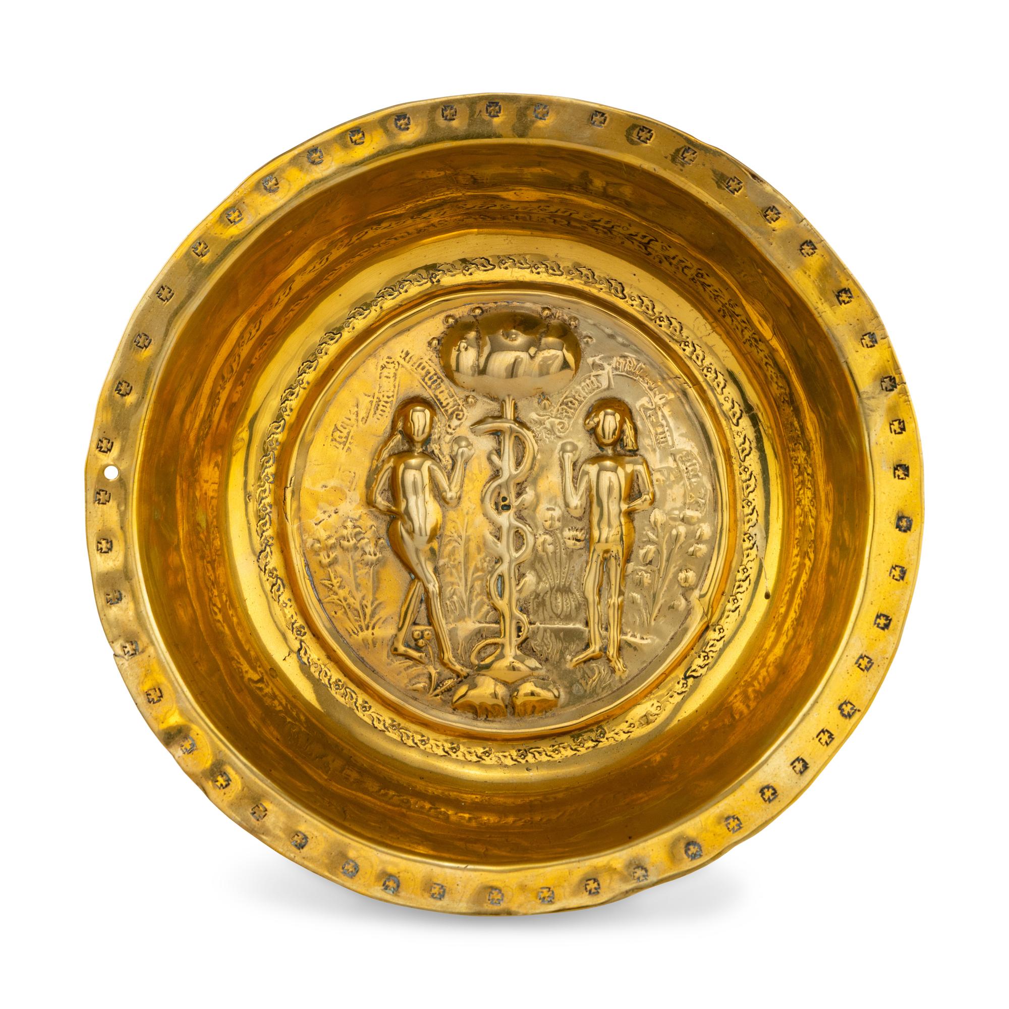 A Nuremburg Brass Adam and Eve Alms Bowl