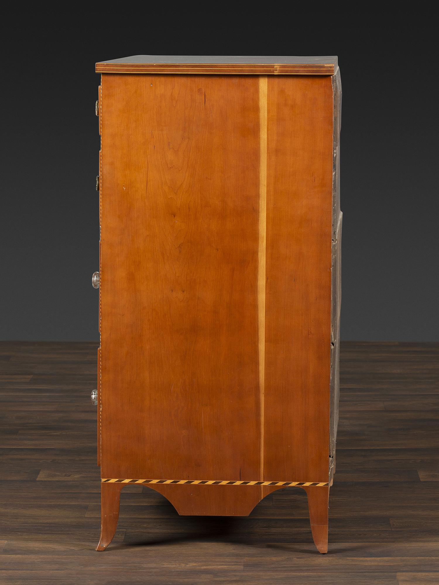 A Federal Fan and Barber Pole Inlaid Cherrywood Chest of Drawers
