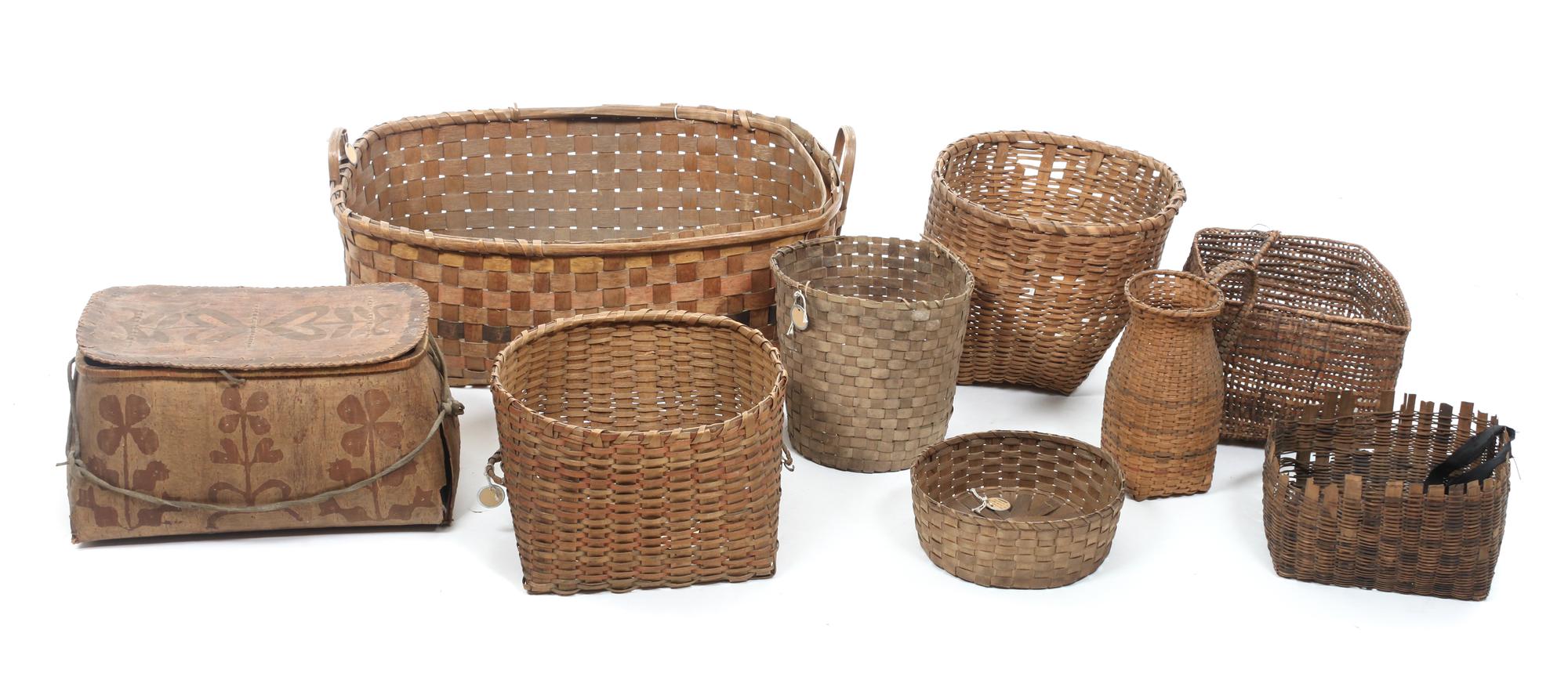 Nine East Coast Native Baskets Height of largest 10 1/2 x length 27 x depth 18 1/2 inches.