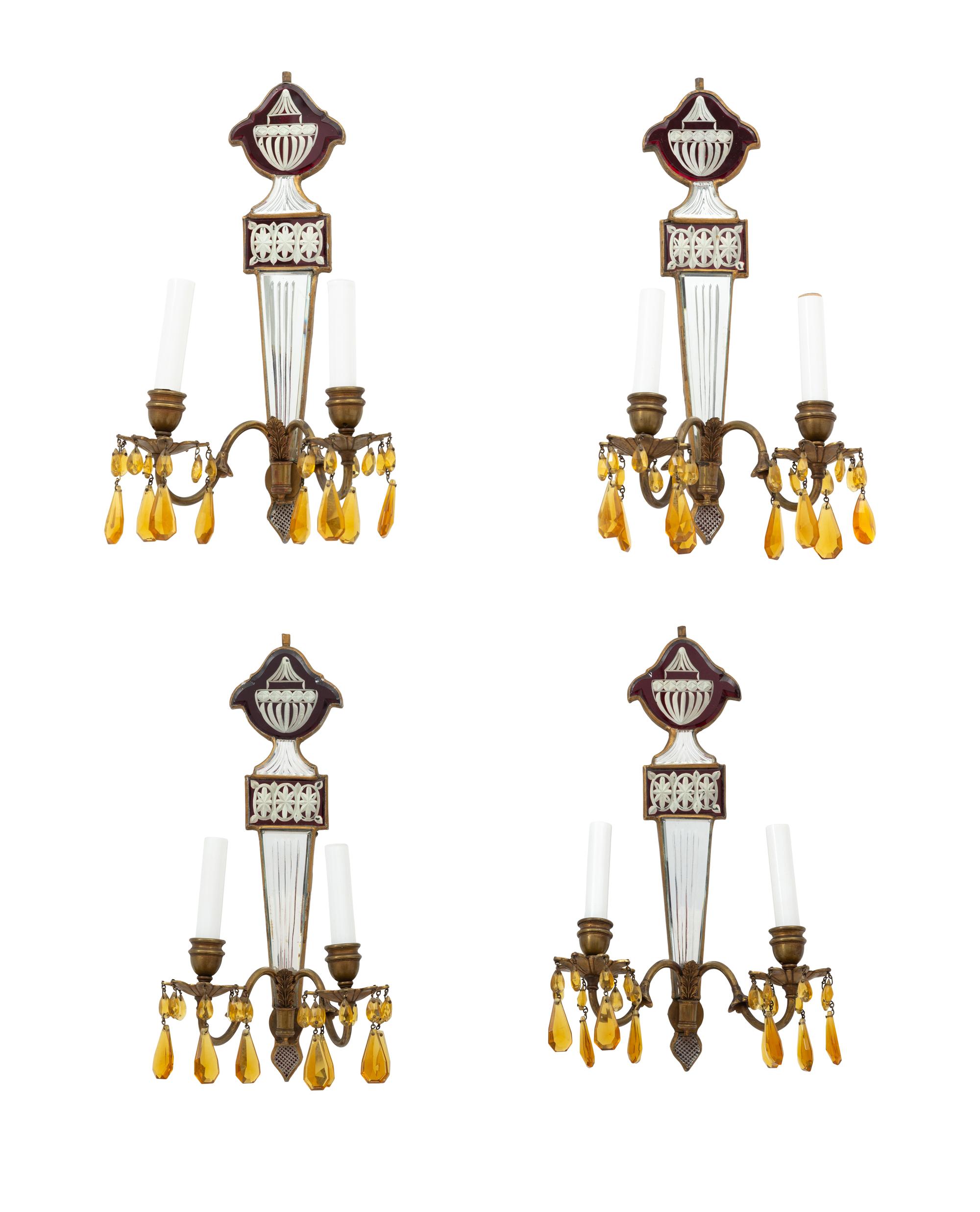 A Set of Four Regency Style Mirrored Two-Light Sconces