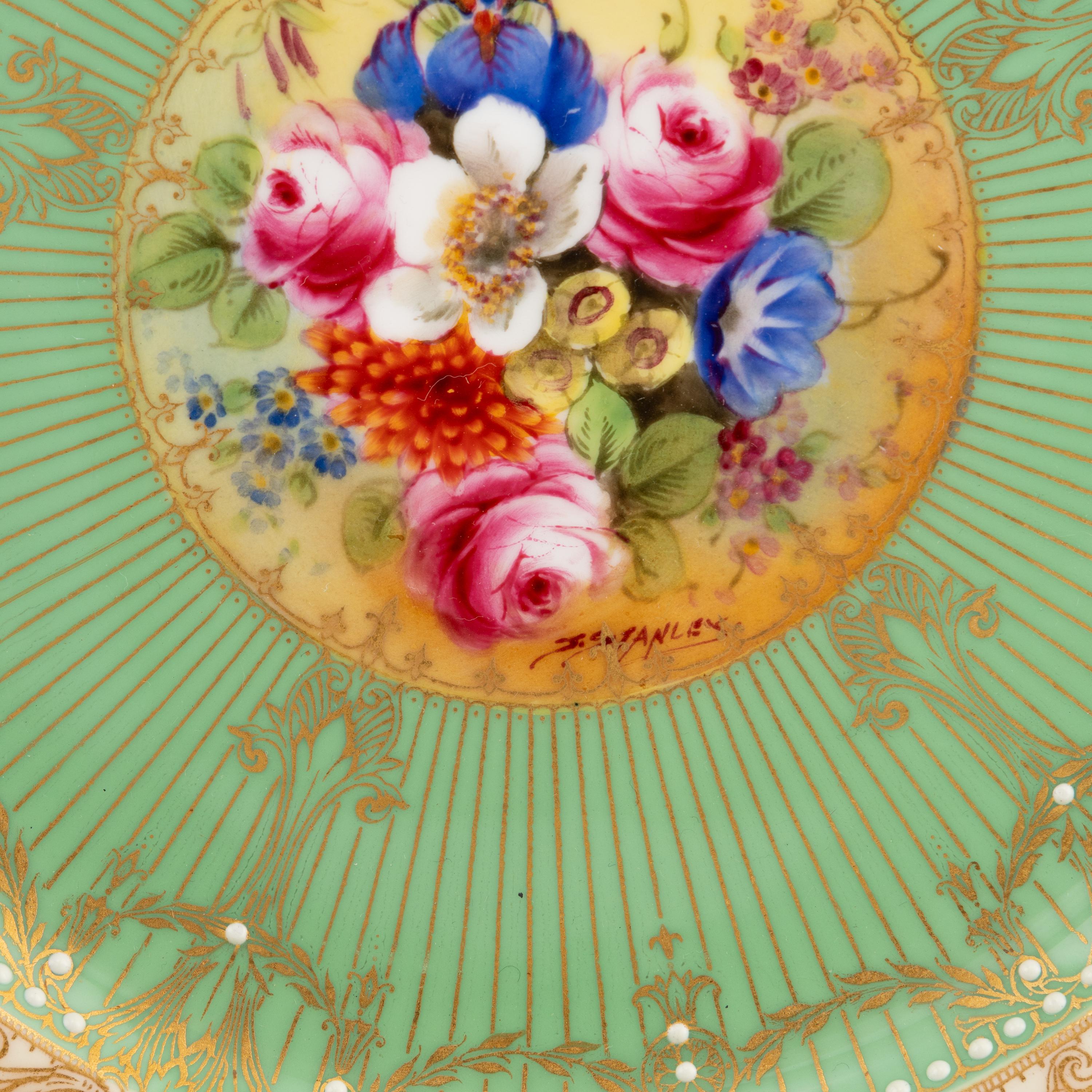 A Set of Seventeen Royal Worcester Painted Porcelain Dessert Plates