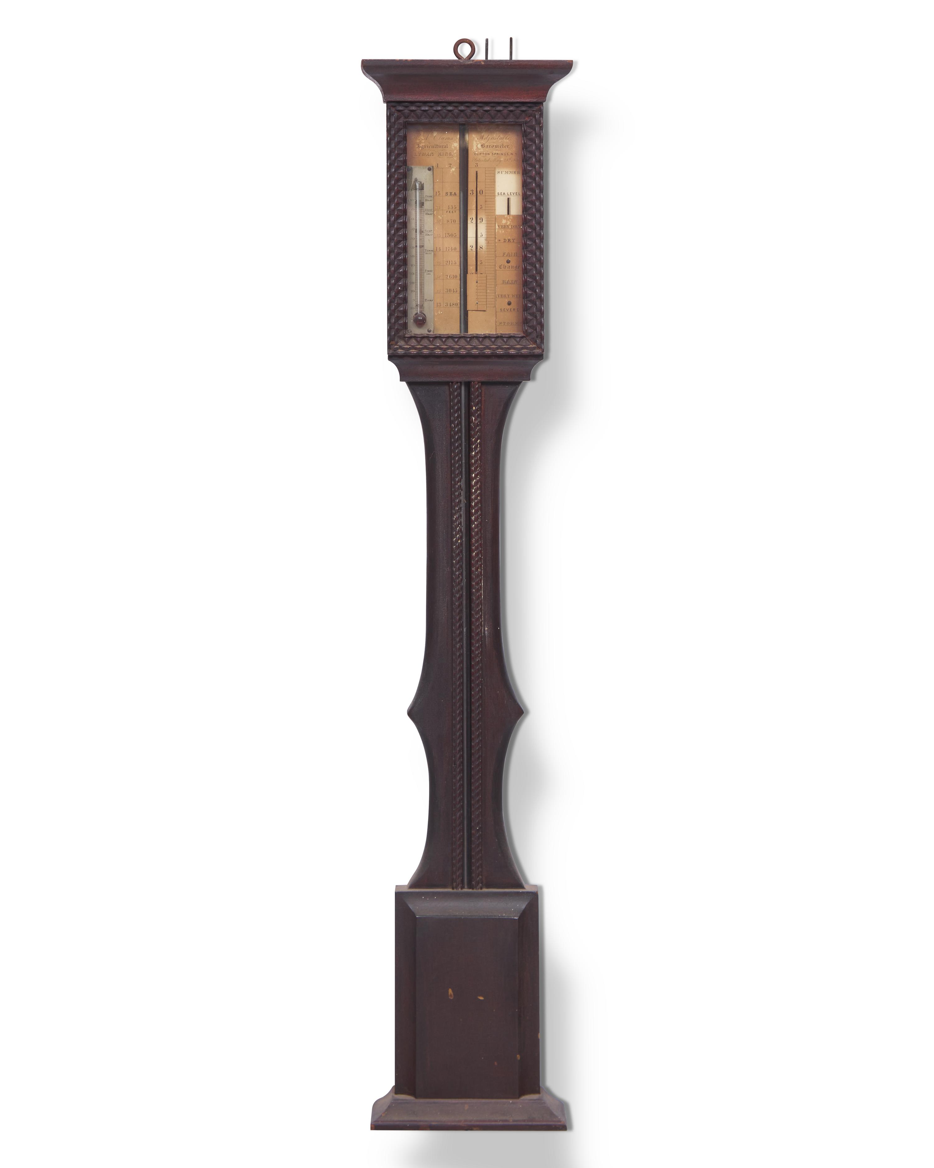 A Carved Mahogany Adjustable Barometer