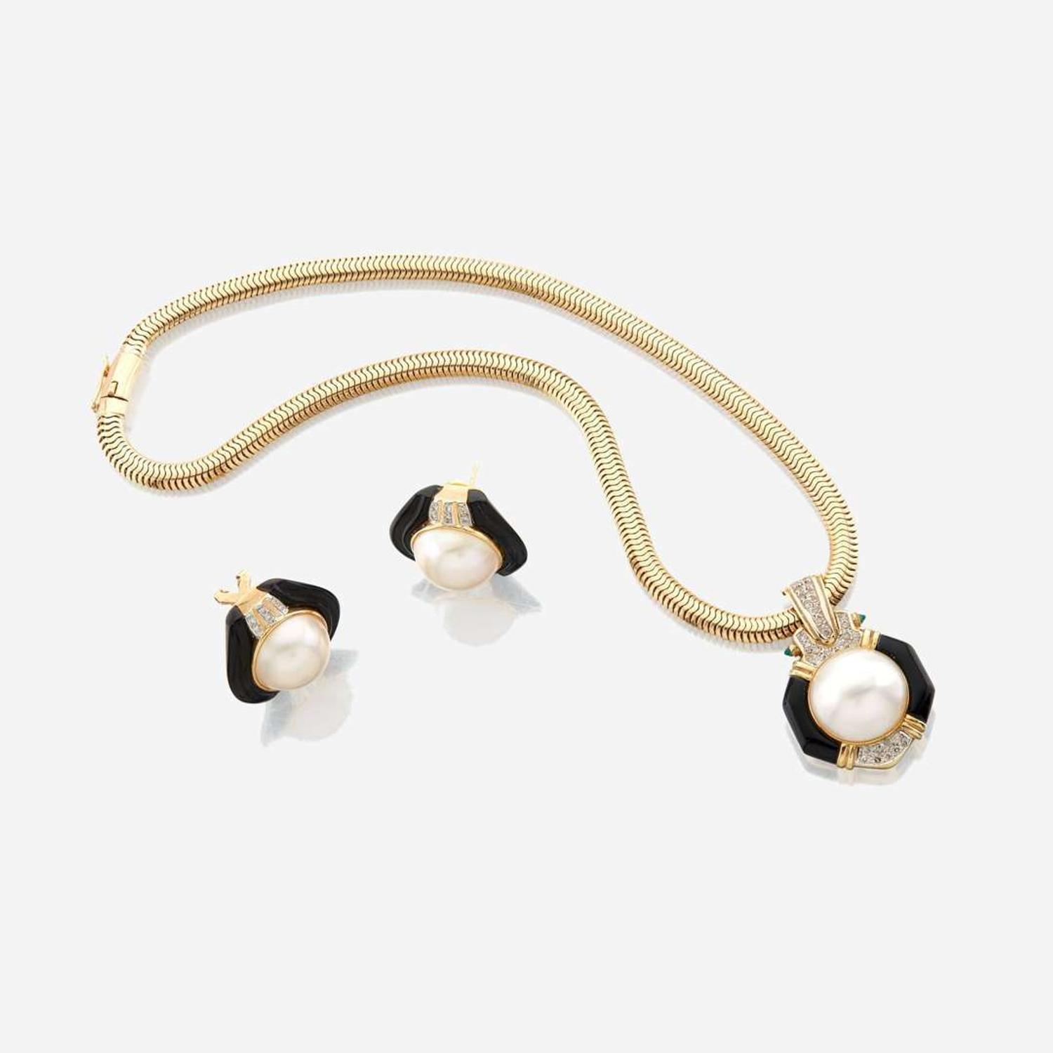 A mabe pearl, diamond, onyx, and gold pendant with matching earrings