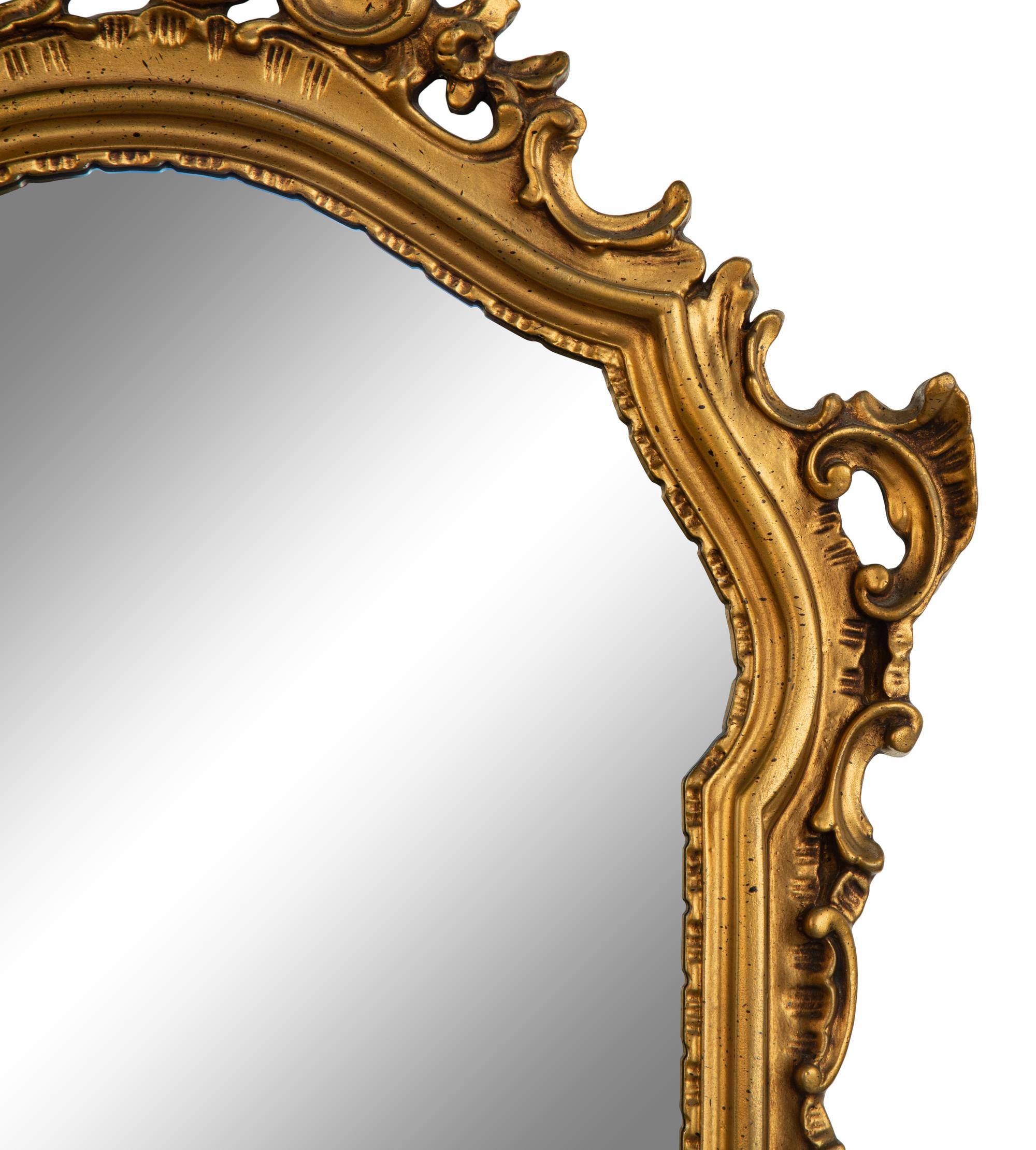 An Italian Baroque Style Giltwood Mirror