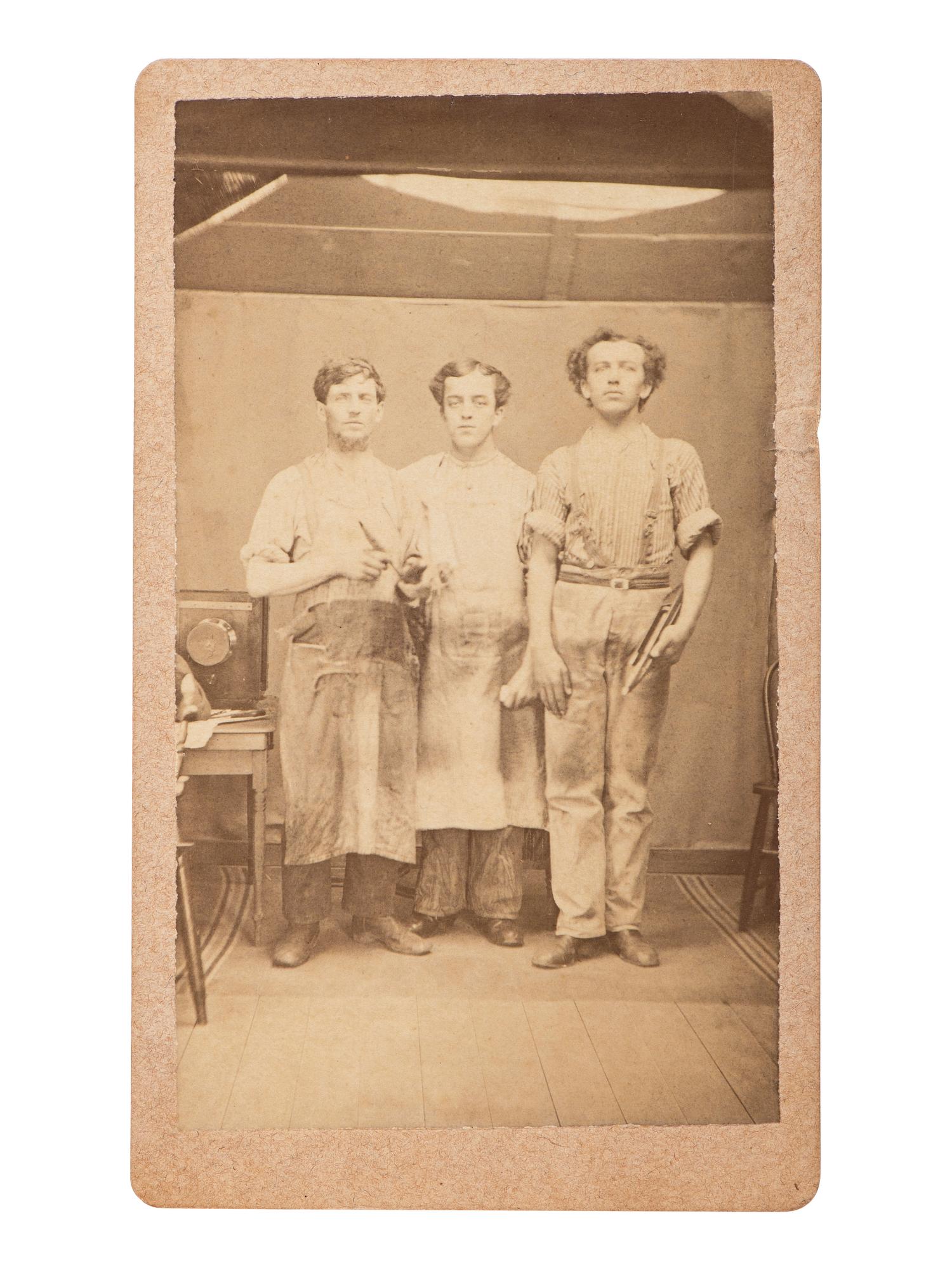 [EARLY PHOTOGRAPHY]. CDV of itinerant photographers with a camera. [Salem, PA]: C.L. Leonard's Portable Gallery, ca 1860s.