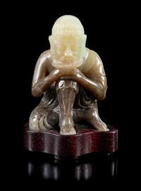 A Black and White Jade Figure of a Damo Height 3 1/2 inches. — 18TH/19TH CENTURY